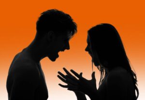 silhouette of a high-conflict couple, yelling at each other